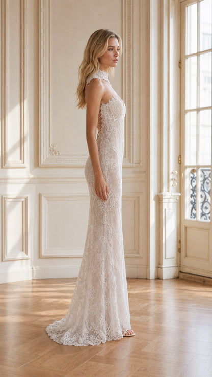 Side profile of ivory lace evening dress highlighting the fitted mermaid silhouette