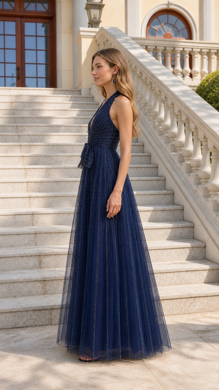 Side view of navy evening gown on outdoor stairs