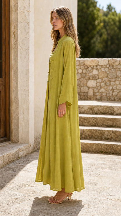 Side profile view of chartreuse two-piece dress set