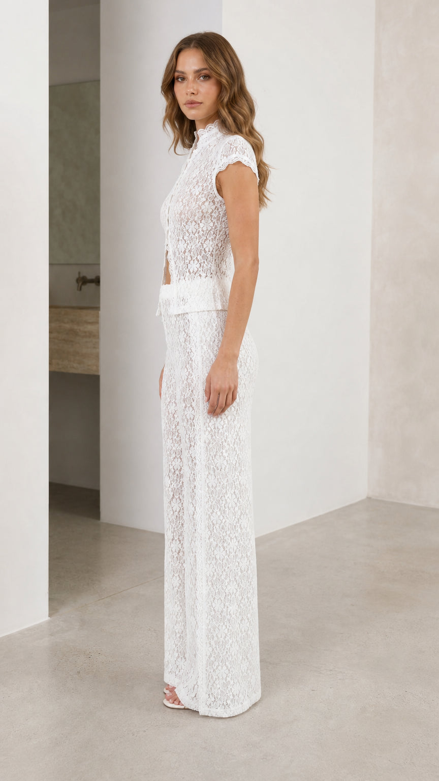 Side profile view of white lace two-piece set