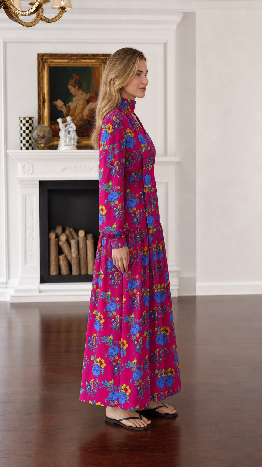 Side view of woman wearing fuchsia floral long-sleeve maxi dress