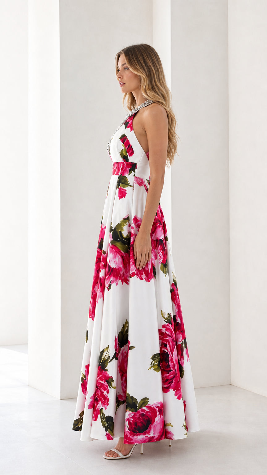 Side profile view of white floral long dress