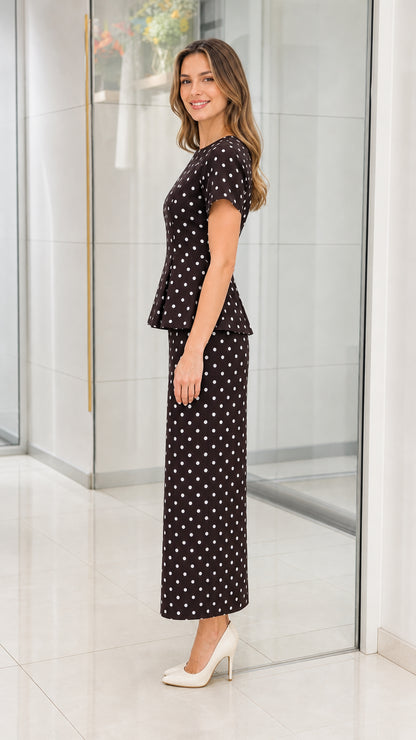Side view of black polka dot two piece set