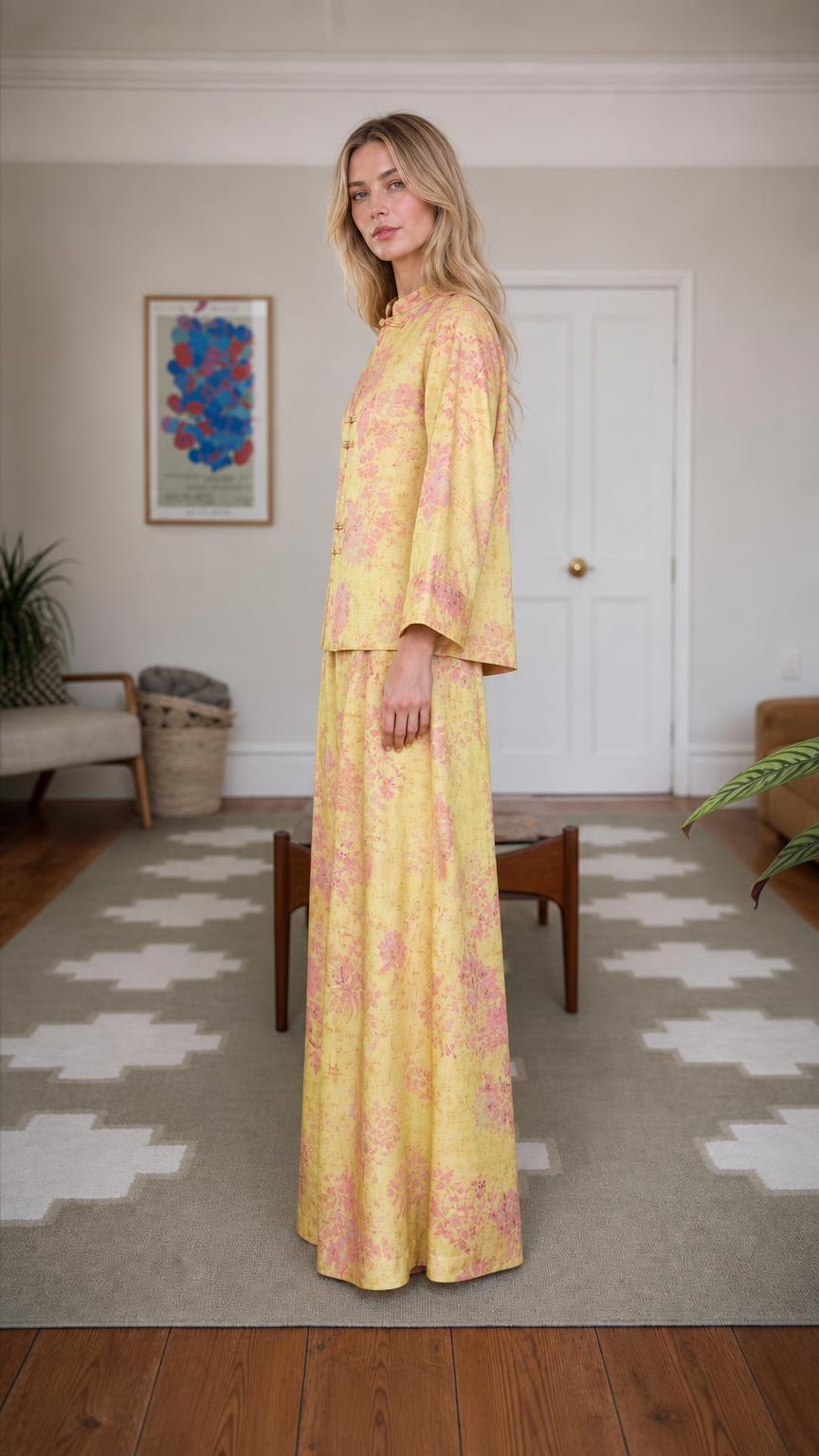 Side profile of woman wearing yellow floral brocade set