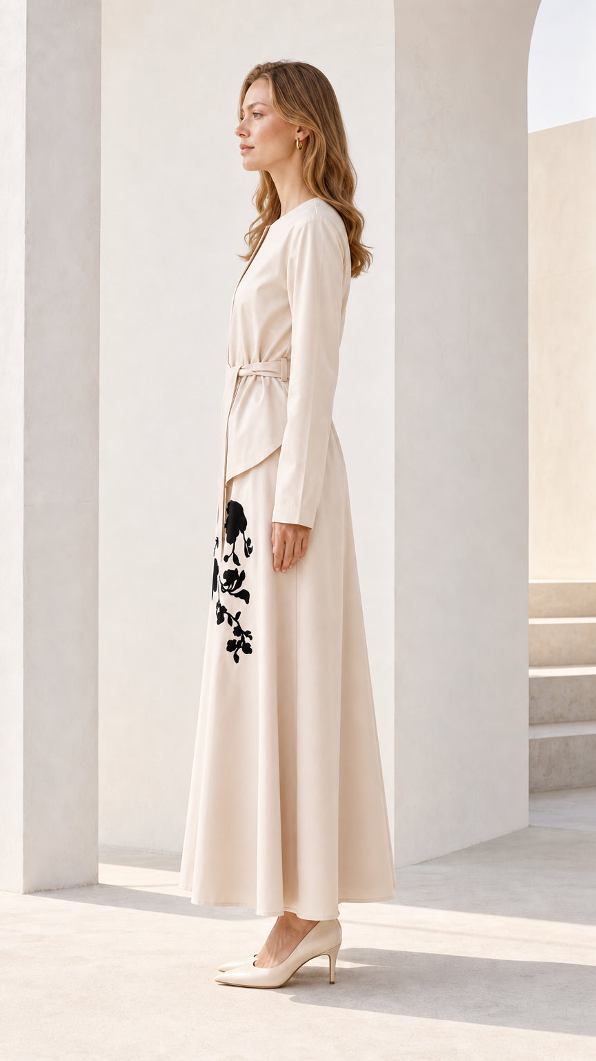 Side profile view of beige maxi dress