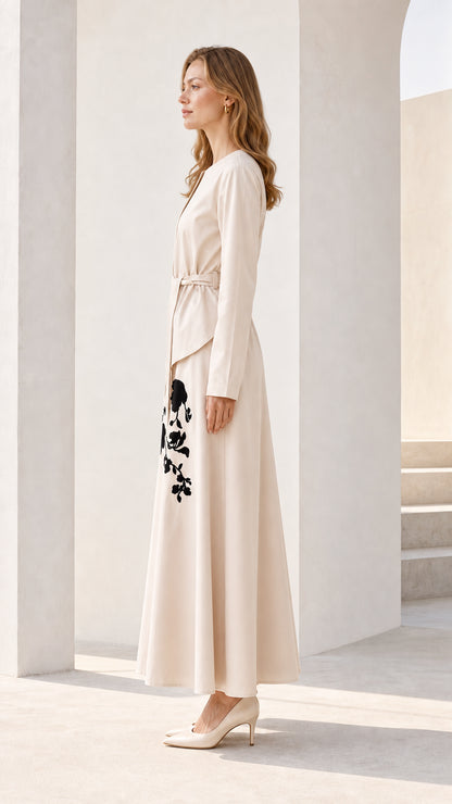 Side profile view of beige maxi dress