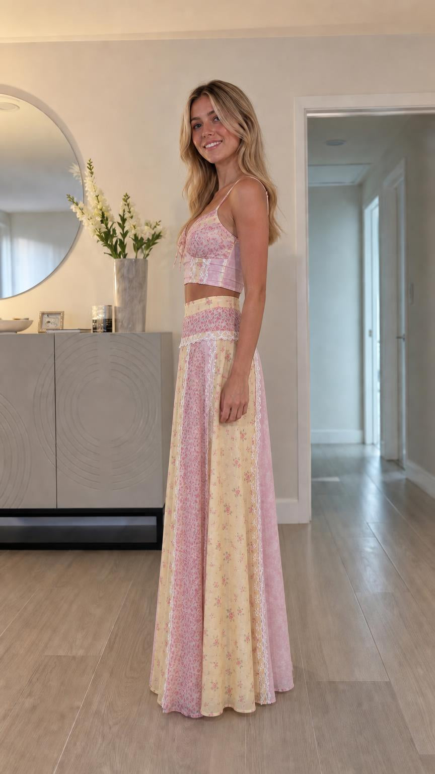 Side profile of model in pink multi two-piece set