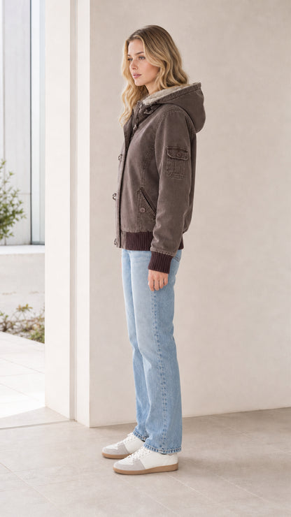 Side profile view of the brown canvas hooded bomber jacket