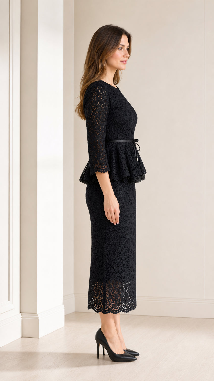 Side profile view of woman in black 3/4 sleeve lace peplum sheath dress