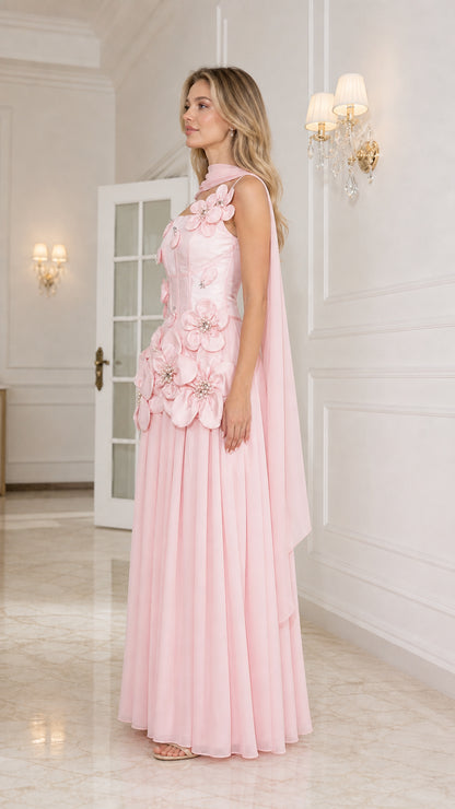Side profile view of pink evening gown with matching stole