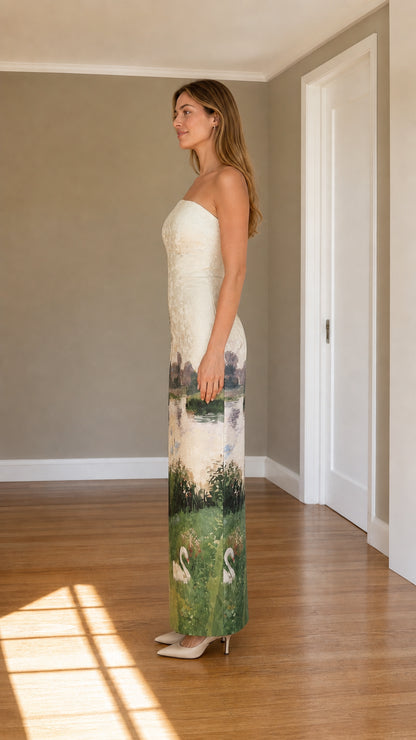 Side view of model in ivory strapless scenic jacquard column maxi dress highlighting the tailored column fit