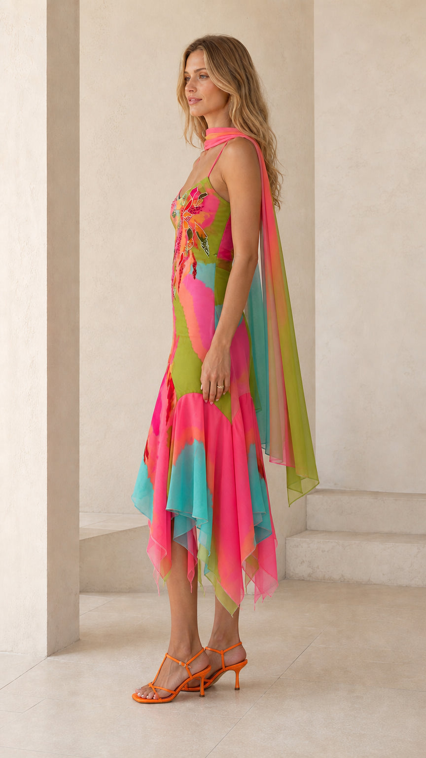 Side profile of vibrant multi pink watercolor midi dress