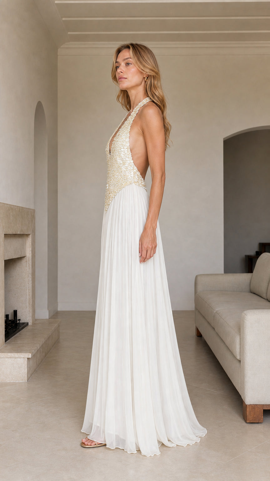 Side profile view of White Sequin Halter Pleated Maxi Dress