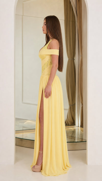 Side profile view of yellow evening gown