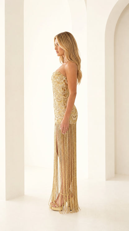 Side view of gold beaded fringe evening dress