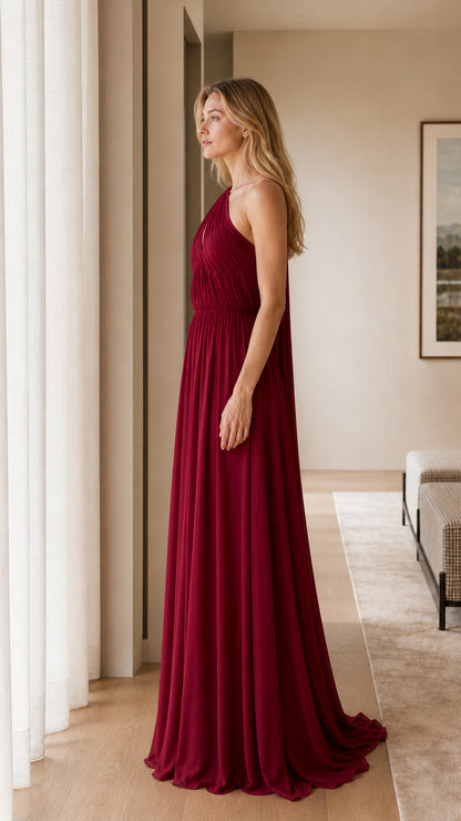 Side profile view of burgundy evening gown