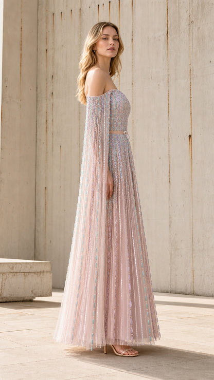 Side profile view of the pink embellished tulle gown