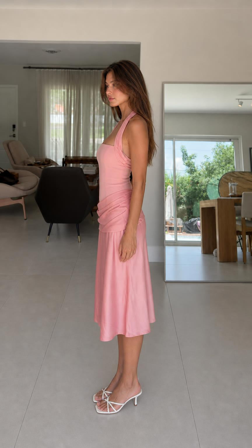 Side profile view of pink midi dress