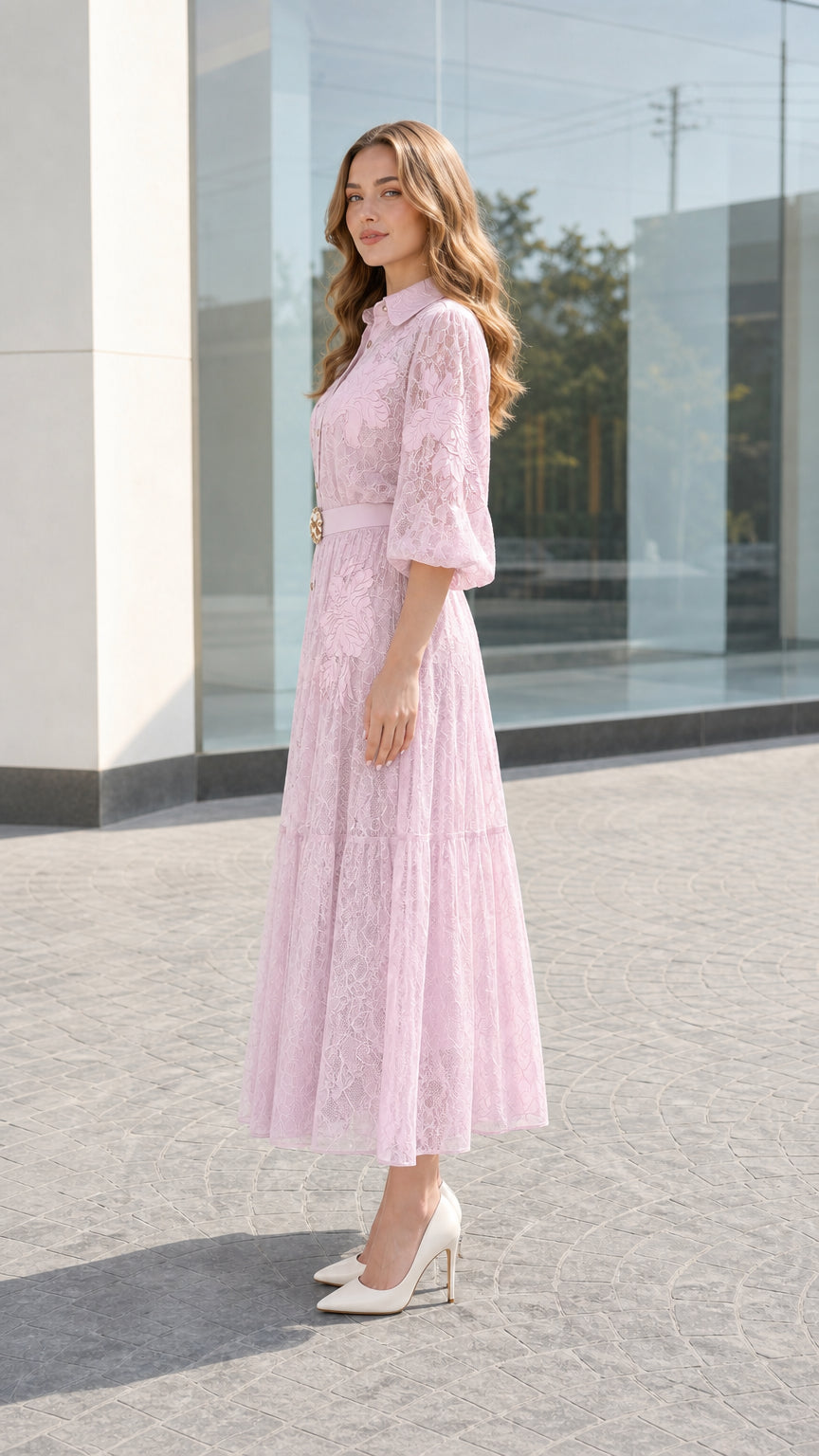 Side profile view of blush pink collared lace shirt dress with tiered skirt