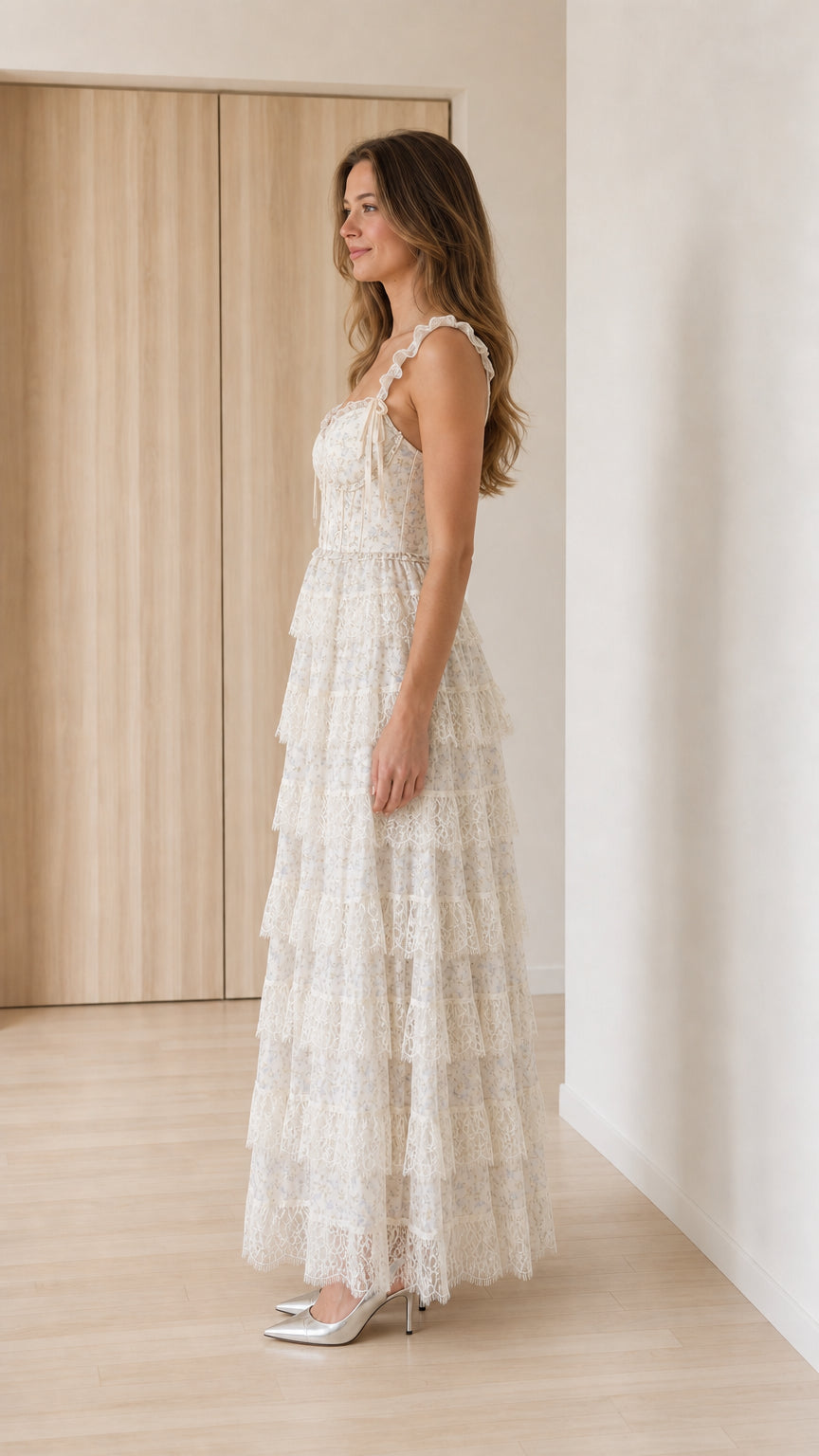 Side profile view of ivory floral lace maxi dress