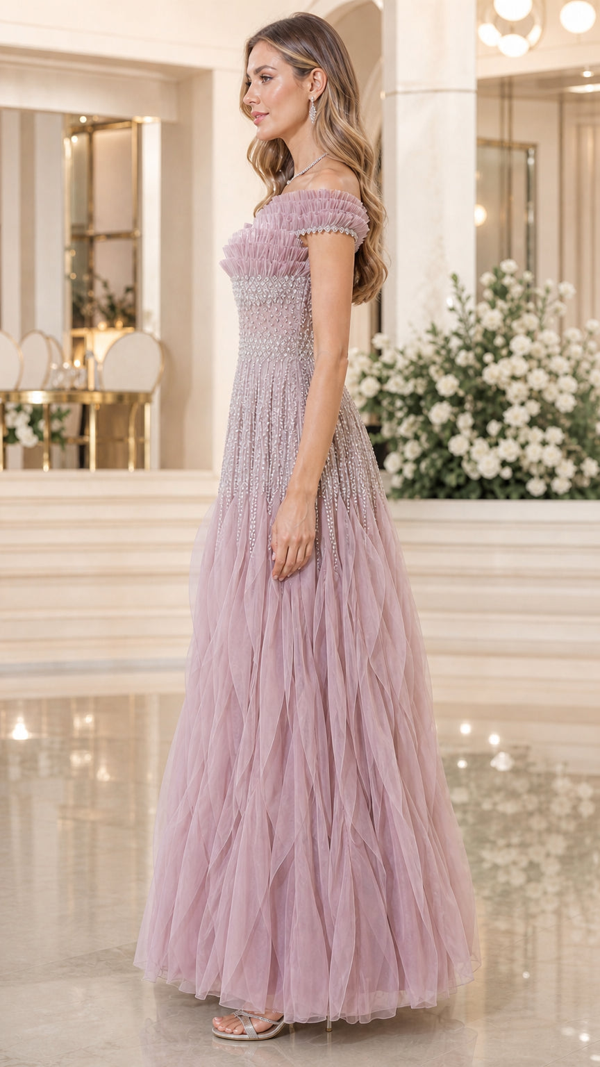 Side profile view of dusty rose evening gown