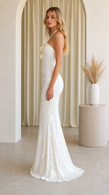 Side profile view of Ivory White halterneck mermaid gown showing fitted silhouette