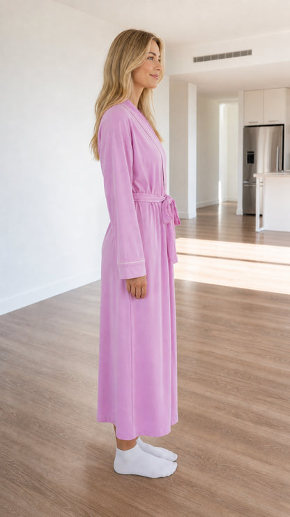 Side view of model in lilac long loungewear robe showing silhouette and drape