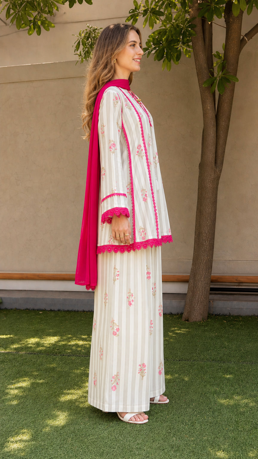 Side profile of woman in white ethnic kurti set with dupatta