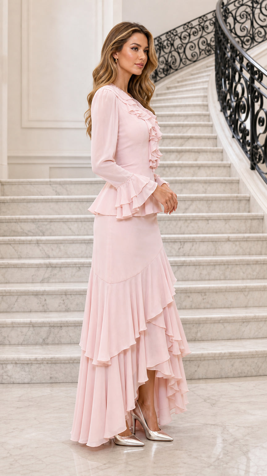Side profile view of pink two-piece ruffled dress set