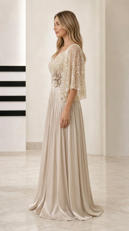 Side profile view of Champagne embellished formal maxi dress with cape sleeves