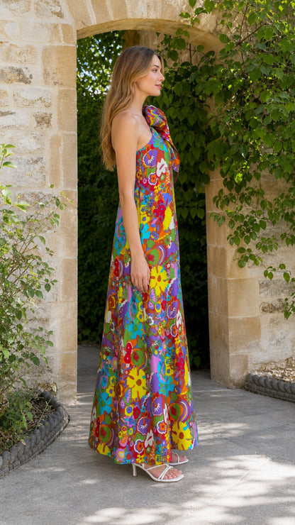 Side profile of model in multi floral maxi dress