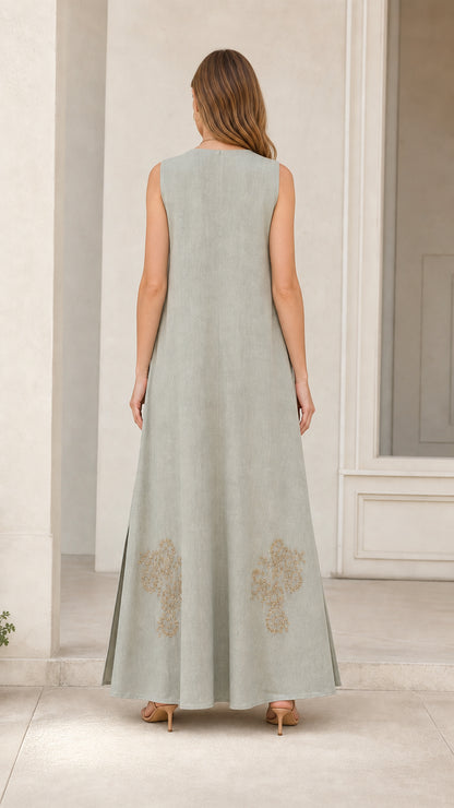Back view of model in sage green maxi dress