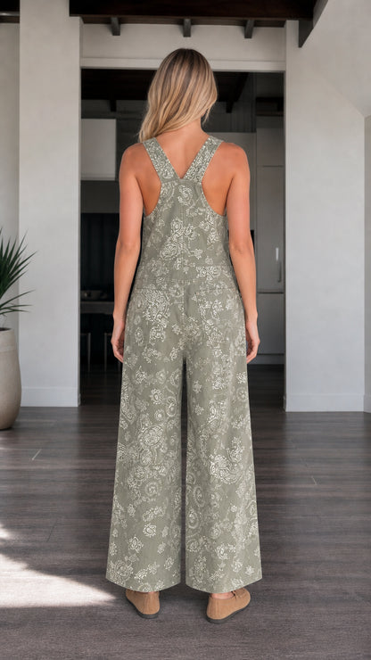 Back view of woman in Sage Green paisley bib overalls showing wide legs