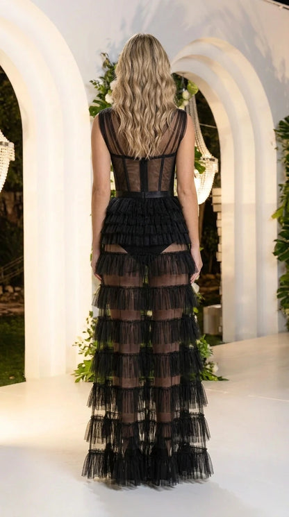 Back view of black one-shoulder corset dress with back zipper detail