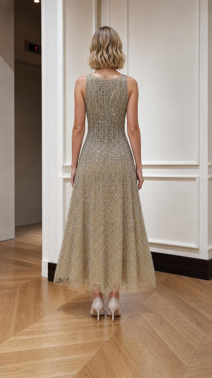 Champagne embellished midi dress shown from the back