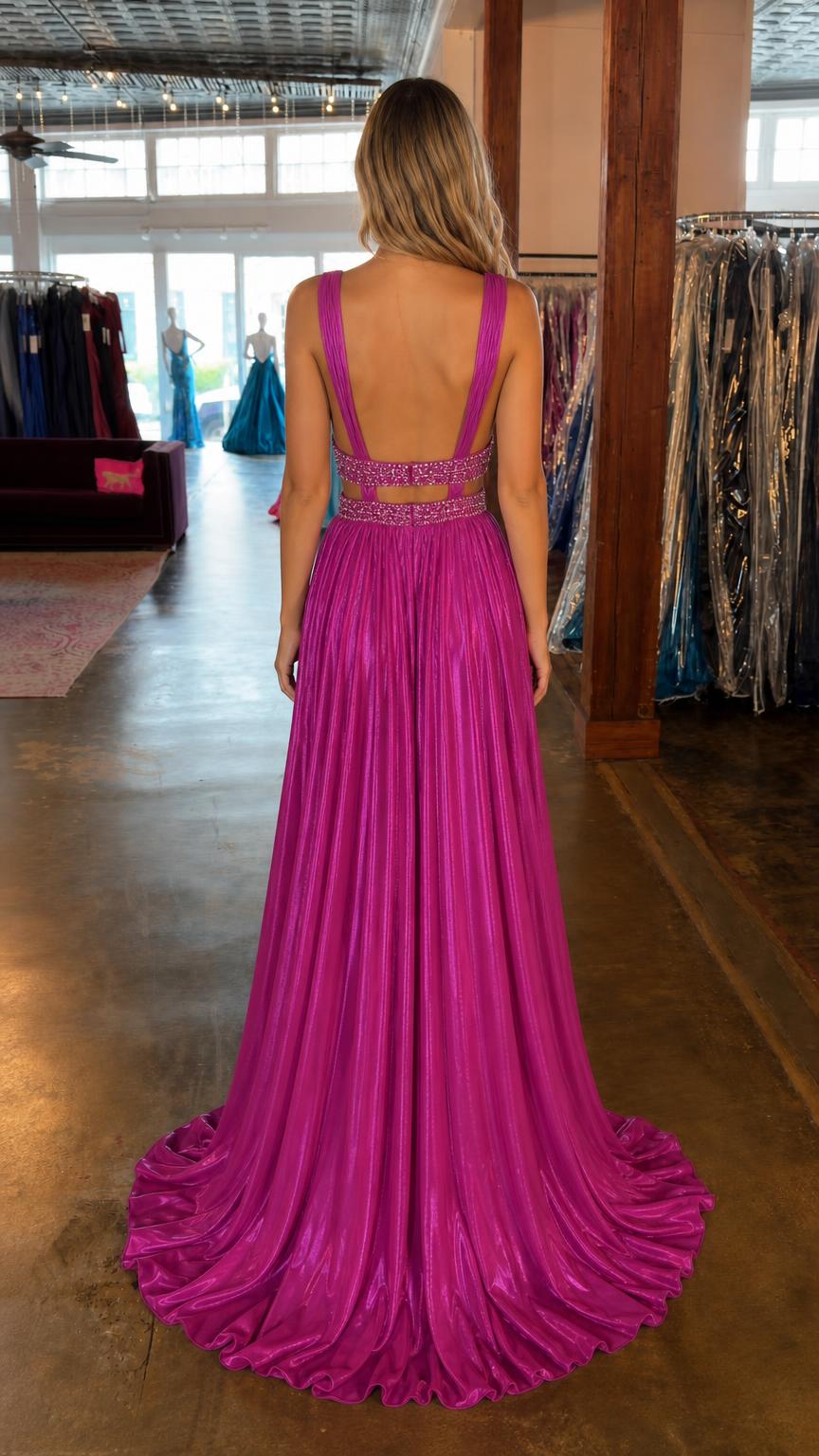 Back view of magenta gown showing open back and sweep train