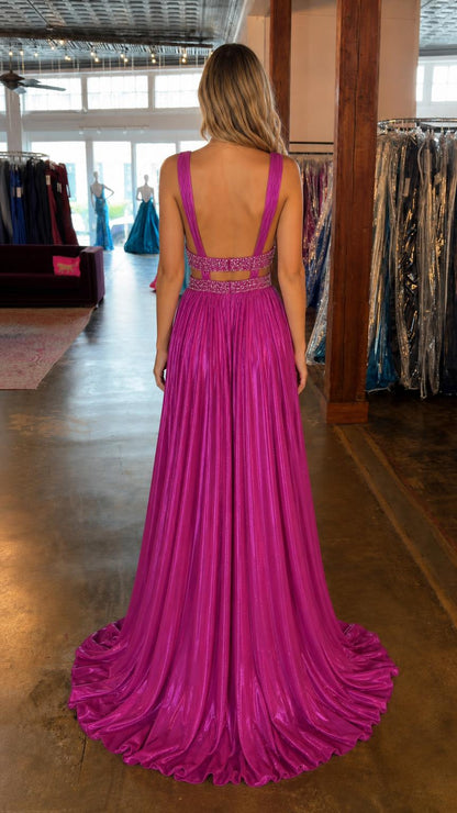 Back view of magenta gown showing open back and sweep train