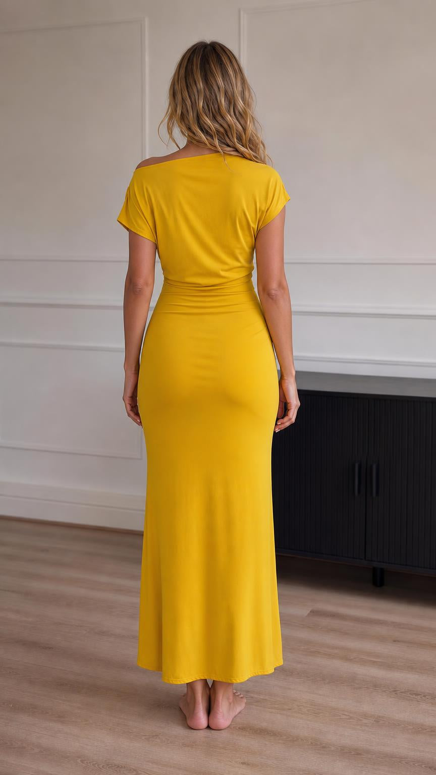 Back view of model in yellow maxi dress