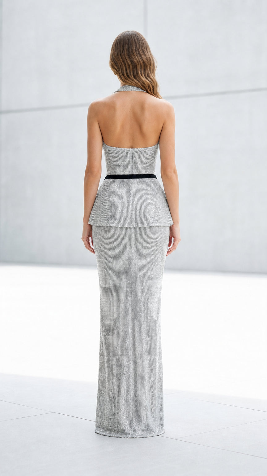 Back view of silver glitter halter maxi dress