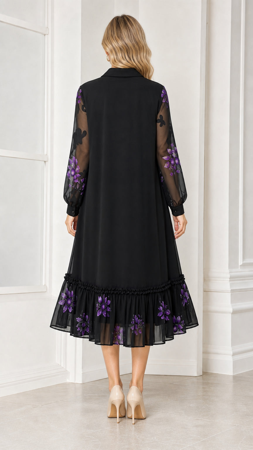 Back view of woman wearing black floral embroidered midi dress