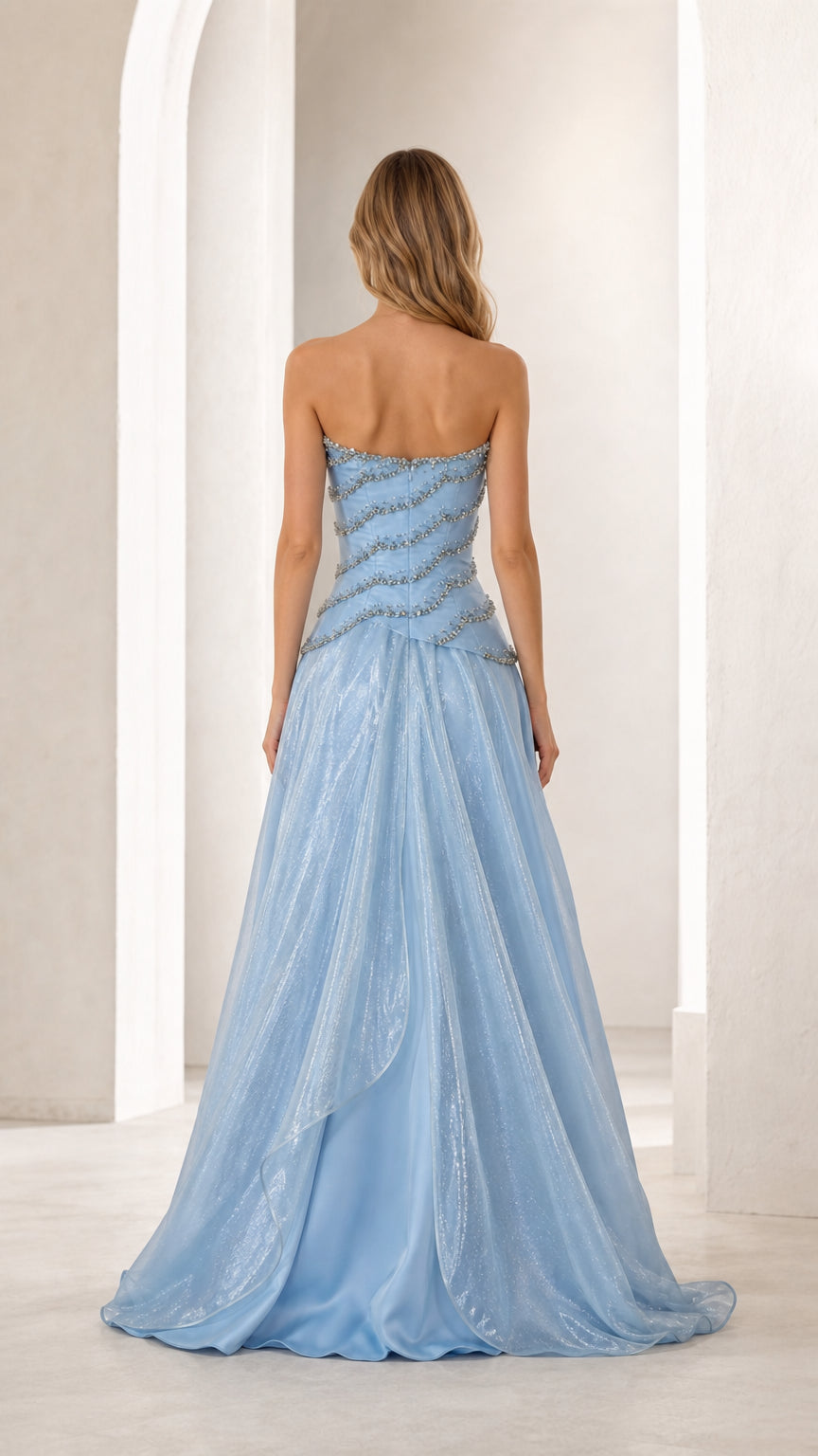 Back view of sky blue strapless floor-length evening dress