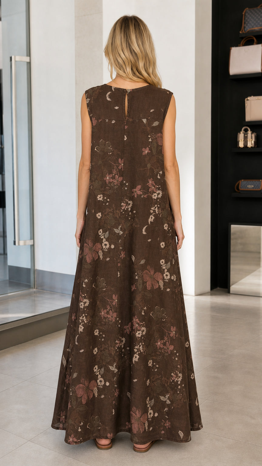 Back view of model wearing brown floral maxi dress