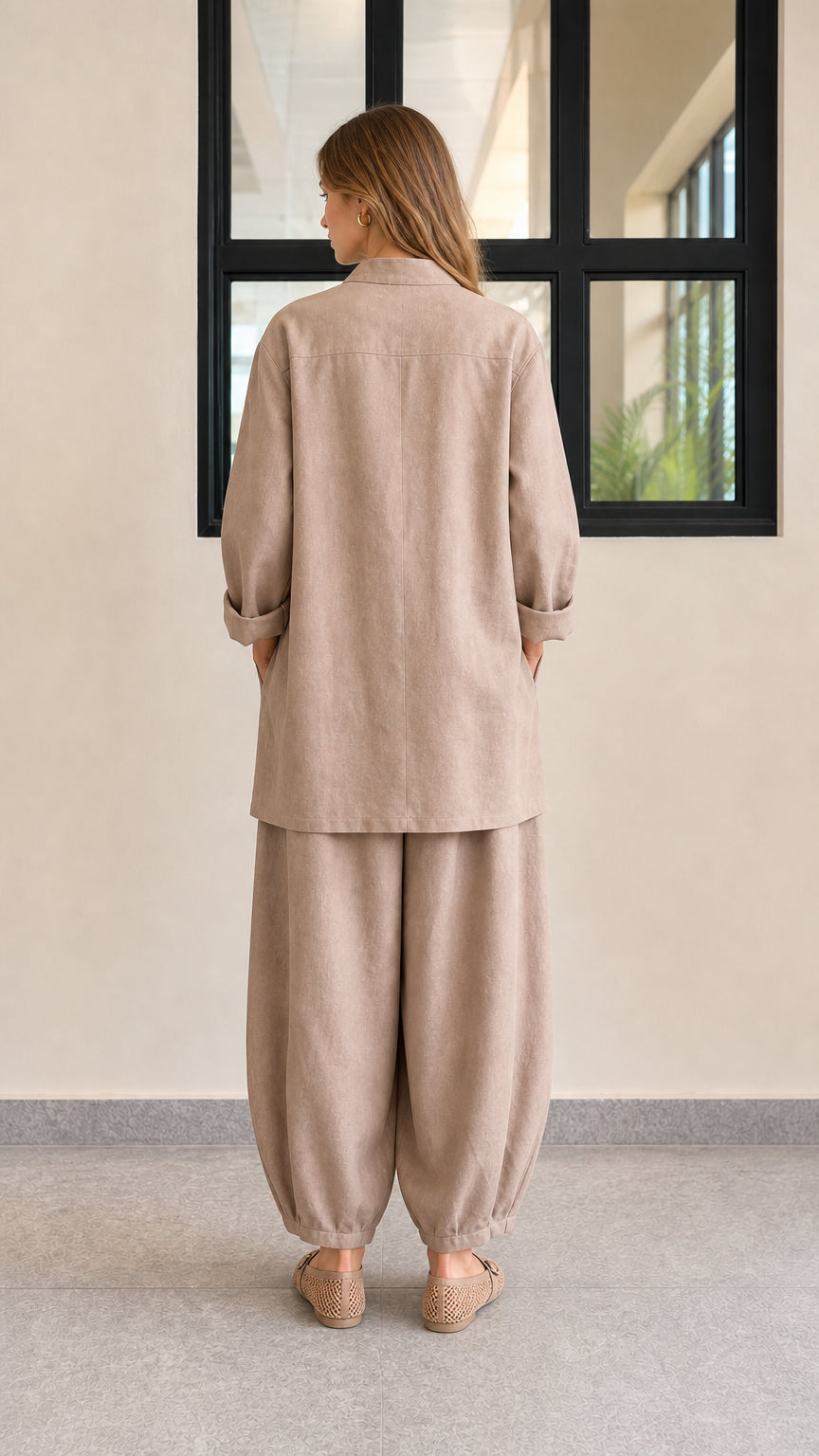 Back view of women's relaxed fit taupe linen blend two-piece set