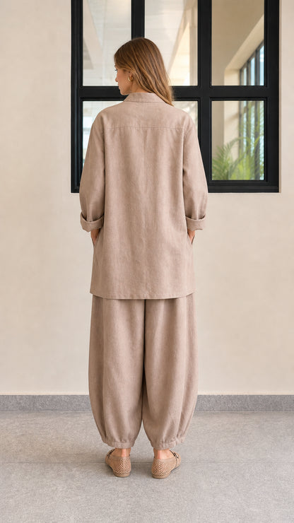 Back view of women's relaxed fit taupe linen blend two-piece set