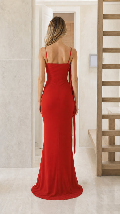 Back view of red evening gown showing fitted silhouette