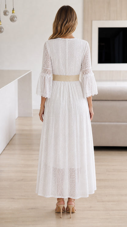 Back view of model wearing white lace maxi dress