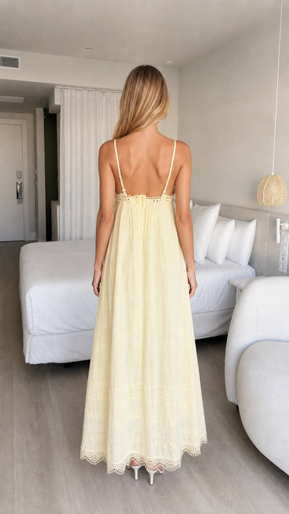 Back view of model showing lace-trimmed back and straps