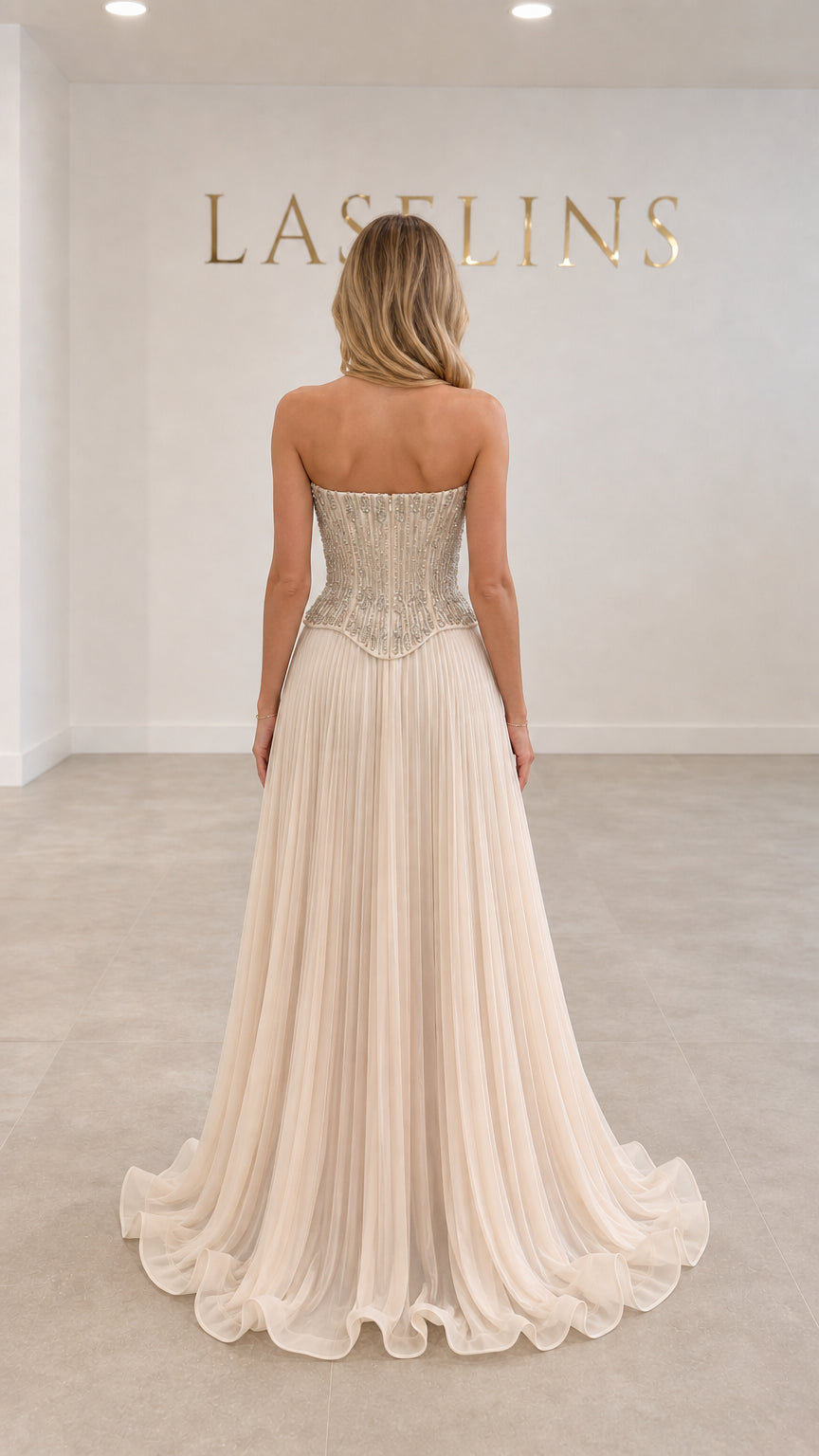 Champagne strapless formal maxi gown back view