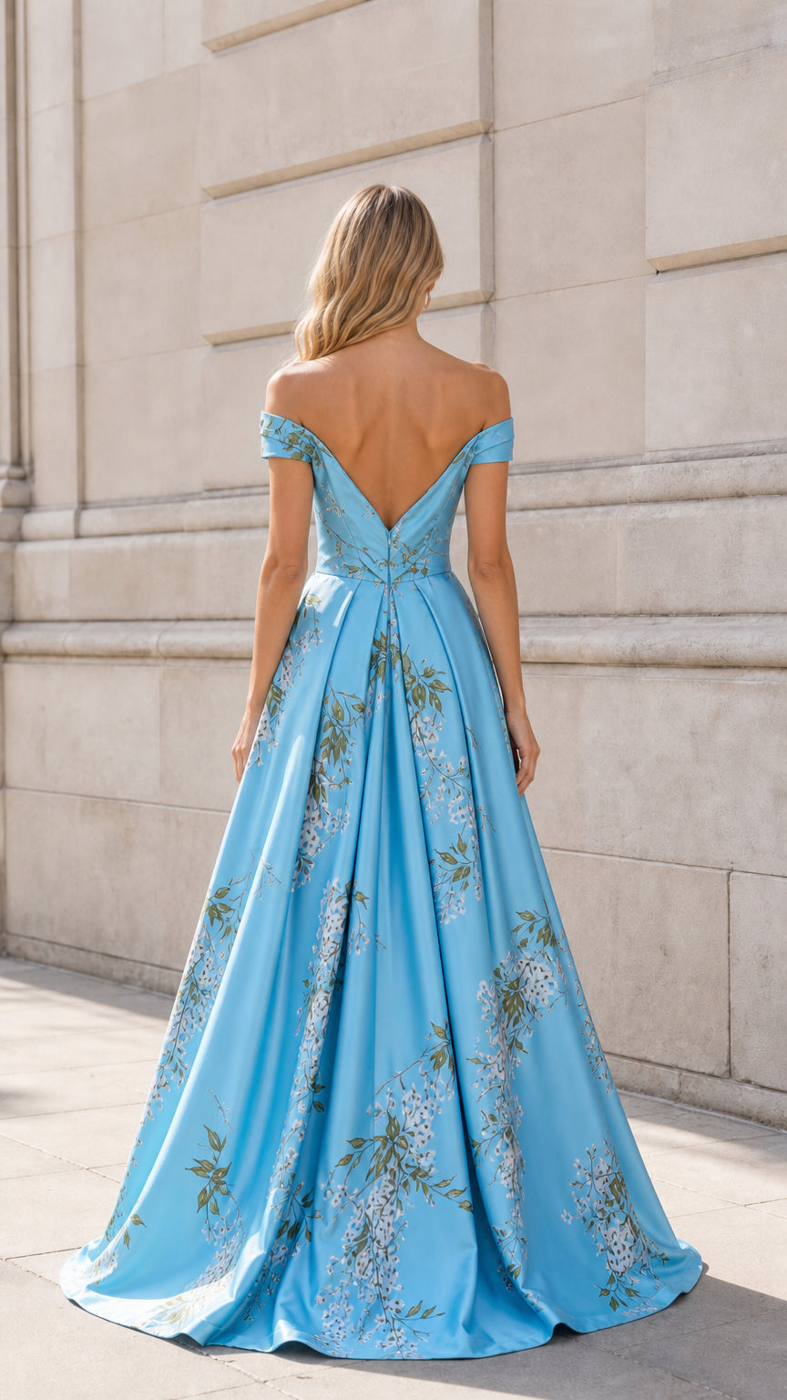 Back view of Light Blue formal gown with V-shaped neckline and sweep train
