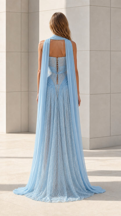 Back view of light blue evening gown featuring corset-style lace-up back detail